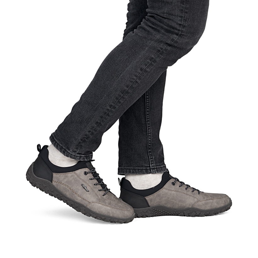 Mocassins Rieker beiges hommes 08150-64 avec la fonctionnalité Highflex. Chaussure au pied.