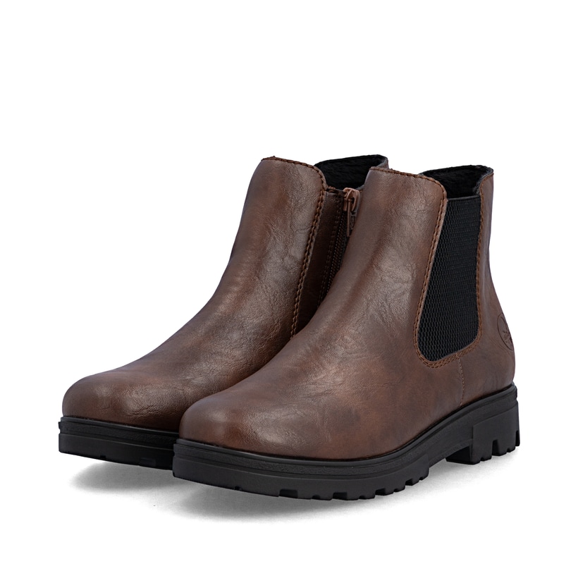 Chelsea Boots Rieker marron pour femmes 43072-22 avec fermeture éclair. Chaussures inclinées sur le côté.