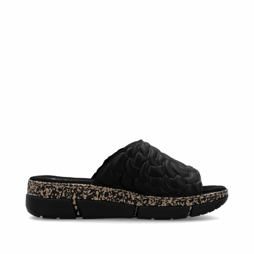 Schwarze Rieker Damen Pantoletten V2351-00 mit floralem Muster. Schuh Innenseite.