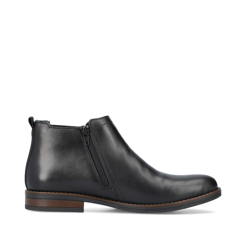 Nachtschwarze Rieker Herren Chelsea Boots 10374-00 mit einer robusten Profilsohle. Schuh Innenseite