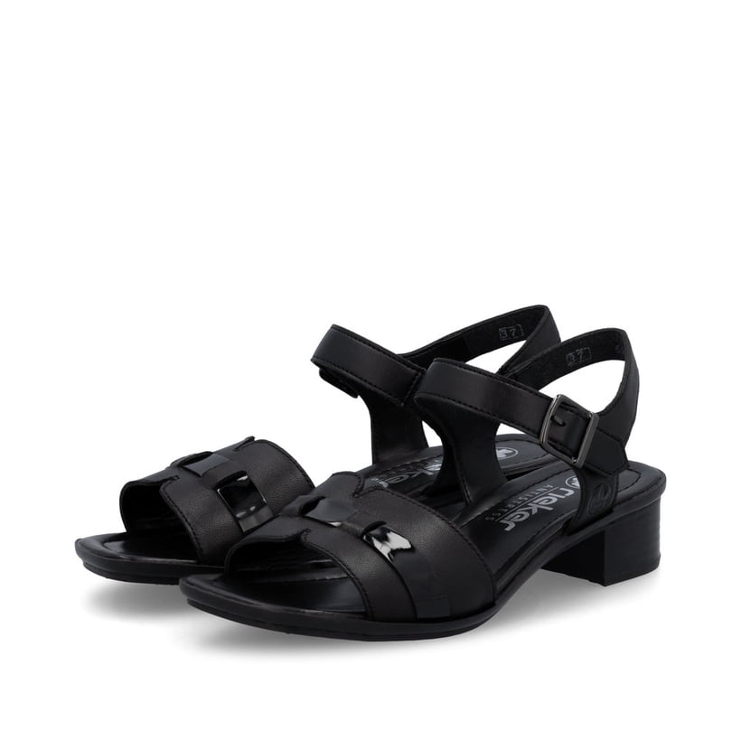 Sandales Rieker noires femme 62685-00 en cuir lisse avec boucle tendance. Chaussures inclinées sur le côté.