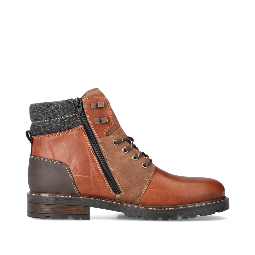 Karamellbraune Rieker Herren Schnürstiefel 32040-25 mit einer robusten Profilsohle. Schuh Innenseite