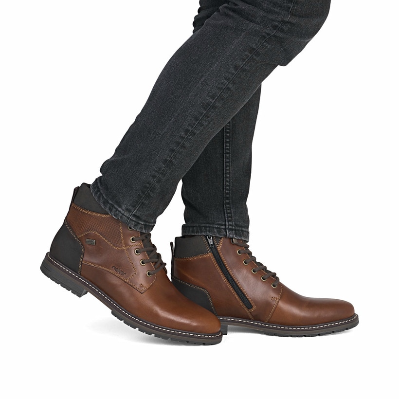 Braune Rieker Herren Schnürstiefel 13740-24 mit wasserabweisender TEX-Membran. Schuh am Fuß.