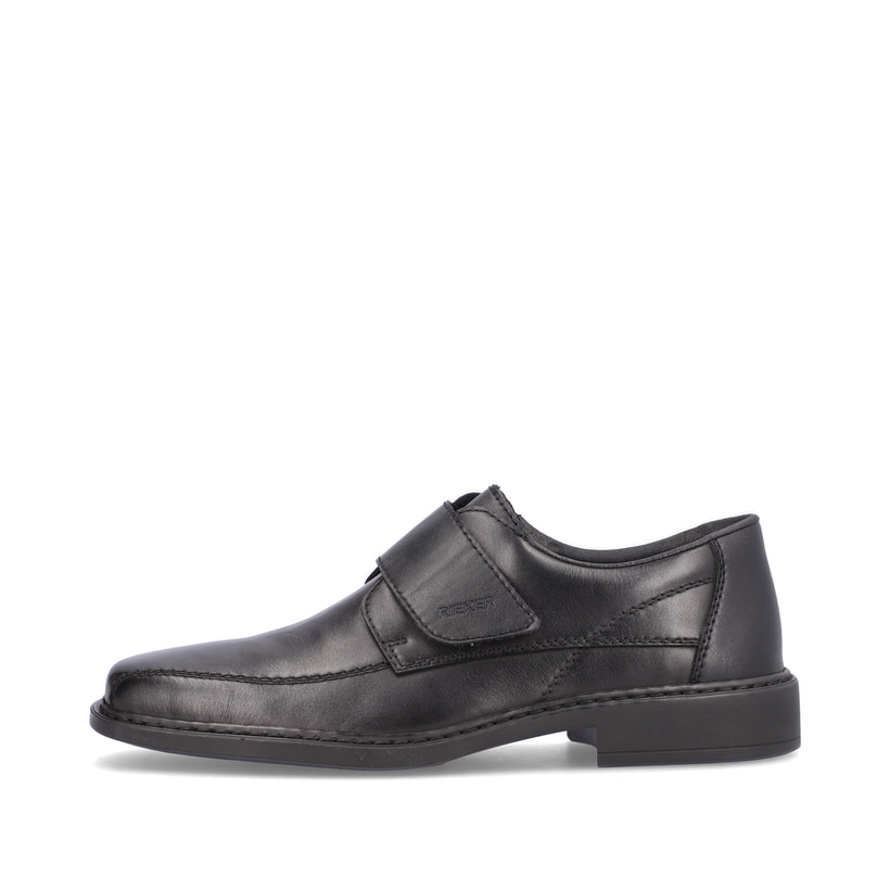 Schwarze Rieker Herren Slipper B0853-00 mit Klettverschluss sowie Extraweite H. Schuh Außenseite.