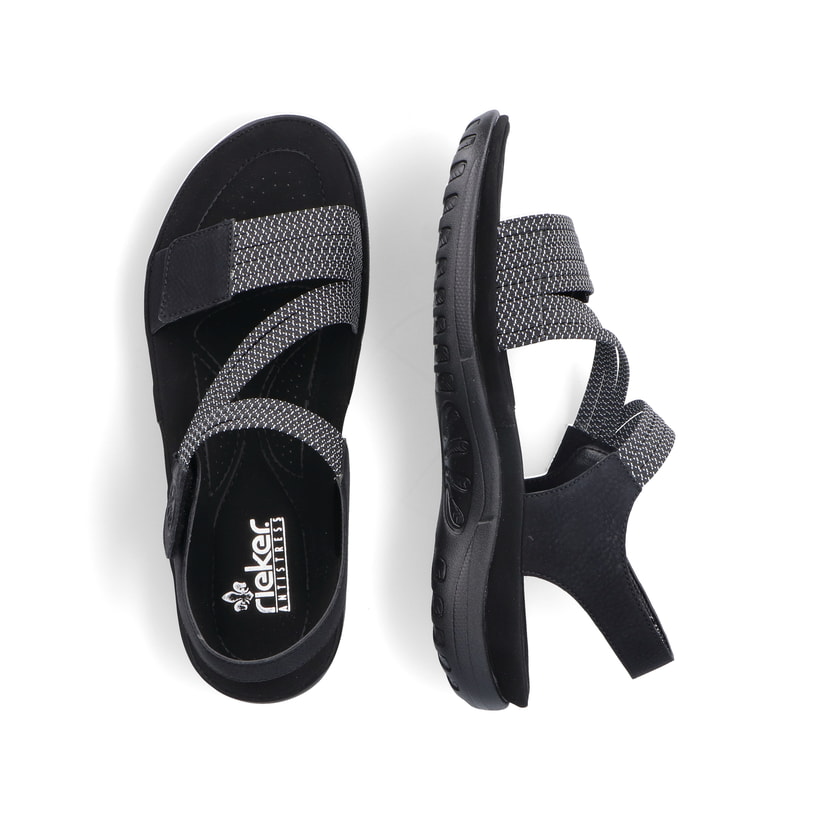 Schwarze vegane Rieker Damen Trekkingsandalen 64870-00 mit einem Klettverschluss. Schuh von oben, liegend.