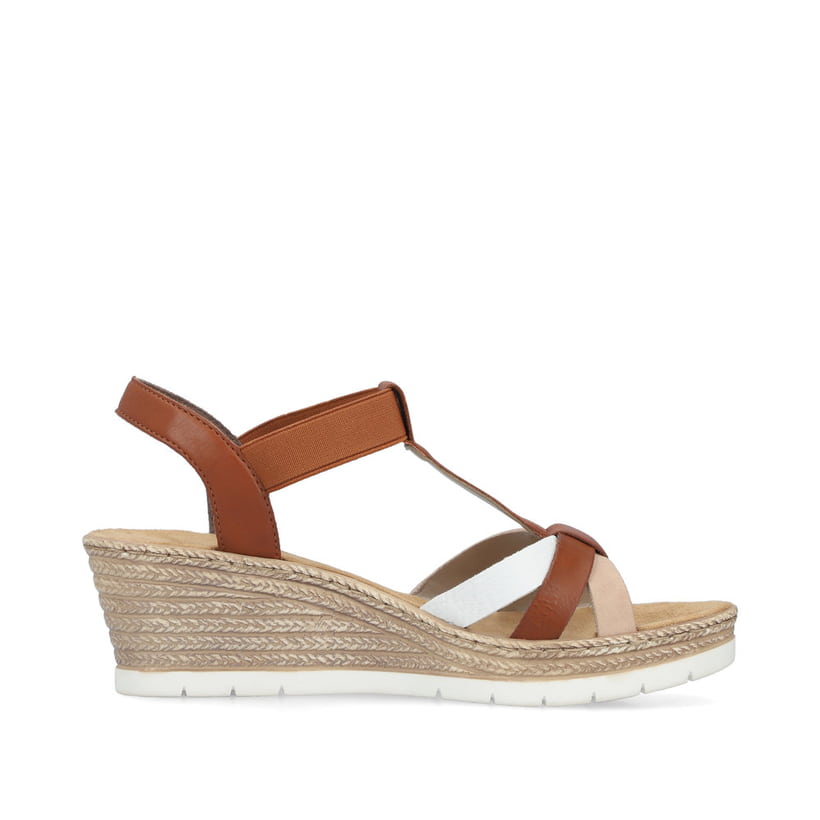 Braune Rieker Keilsandaletten 61995-81 mit einem Gummizug sowie leichter Sohle. Schuh Innenseite.