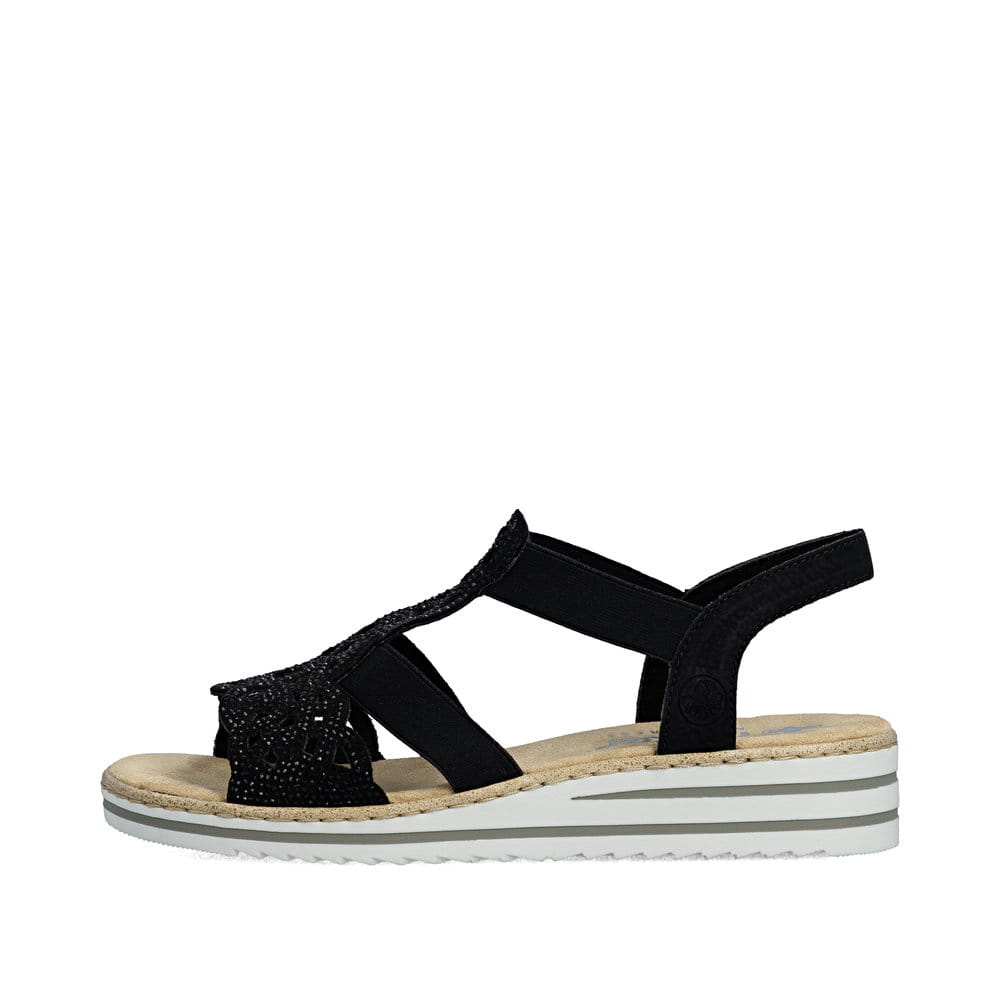 Schwarze Rieker Damen Sandalen V0646-00 mit Strasssteinen sowie einem Gummizug. Schuh Außenseite.