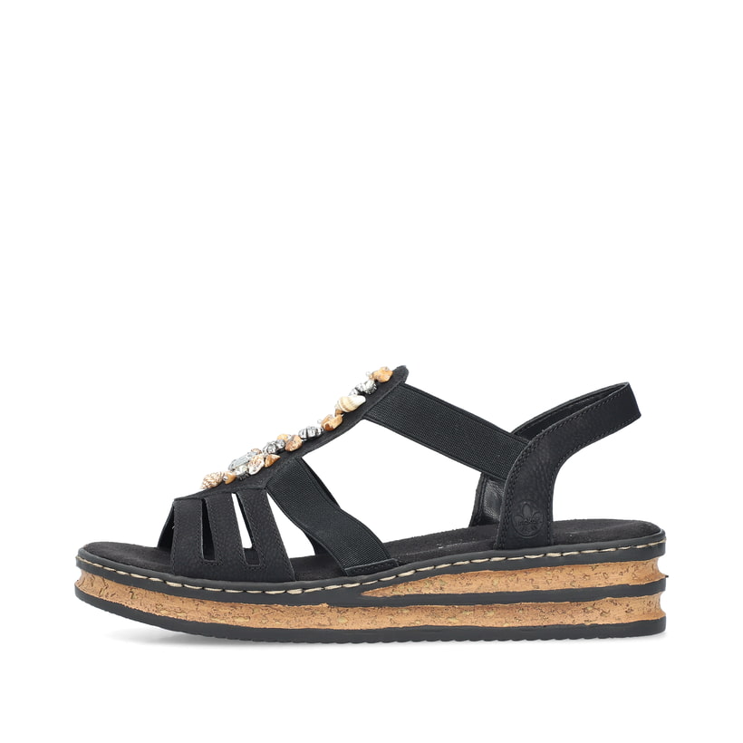 Schwarze Rieker Keilsandaletten 62949-00 mit Schmuckelementen sowie Gummizug. Schuh Außenseite.
