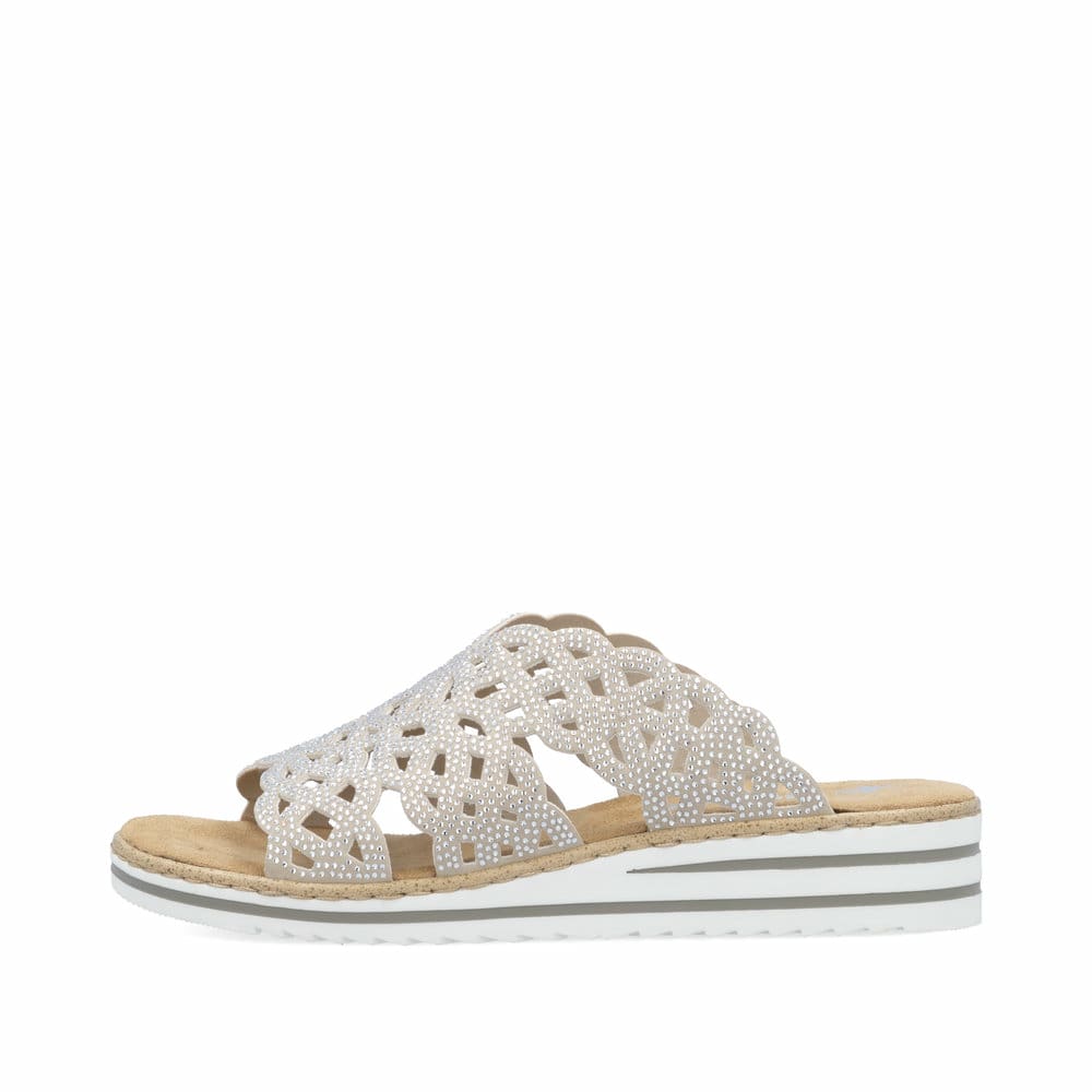 Beige Rieker Damen Pantoletten V0689-63 mit Strasssteinen. Schuh Außenseite.