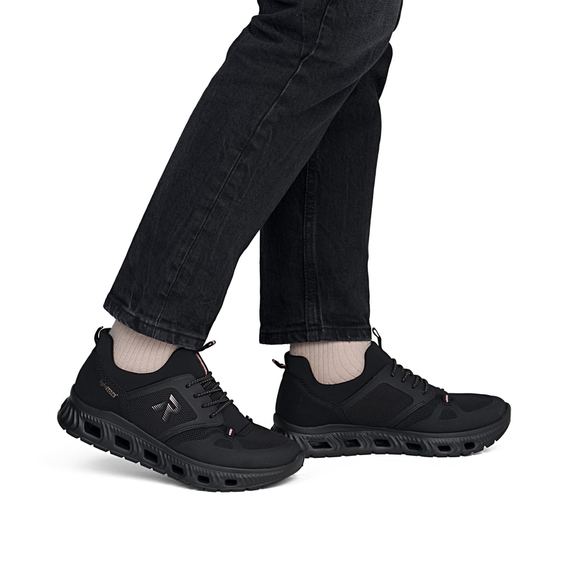 Mocassins Rieker noirs végan pour femmes M6078-00 avec bande élastique. Chaussure au pied.