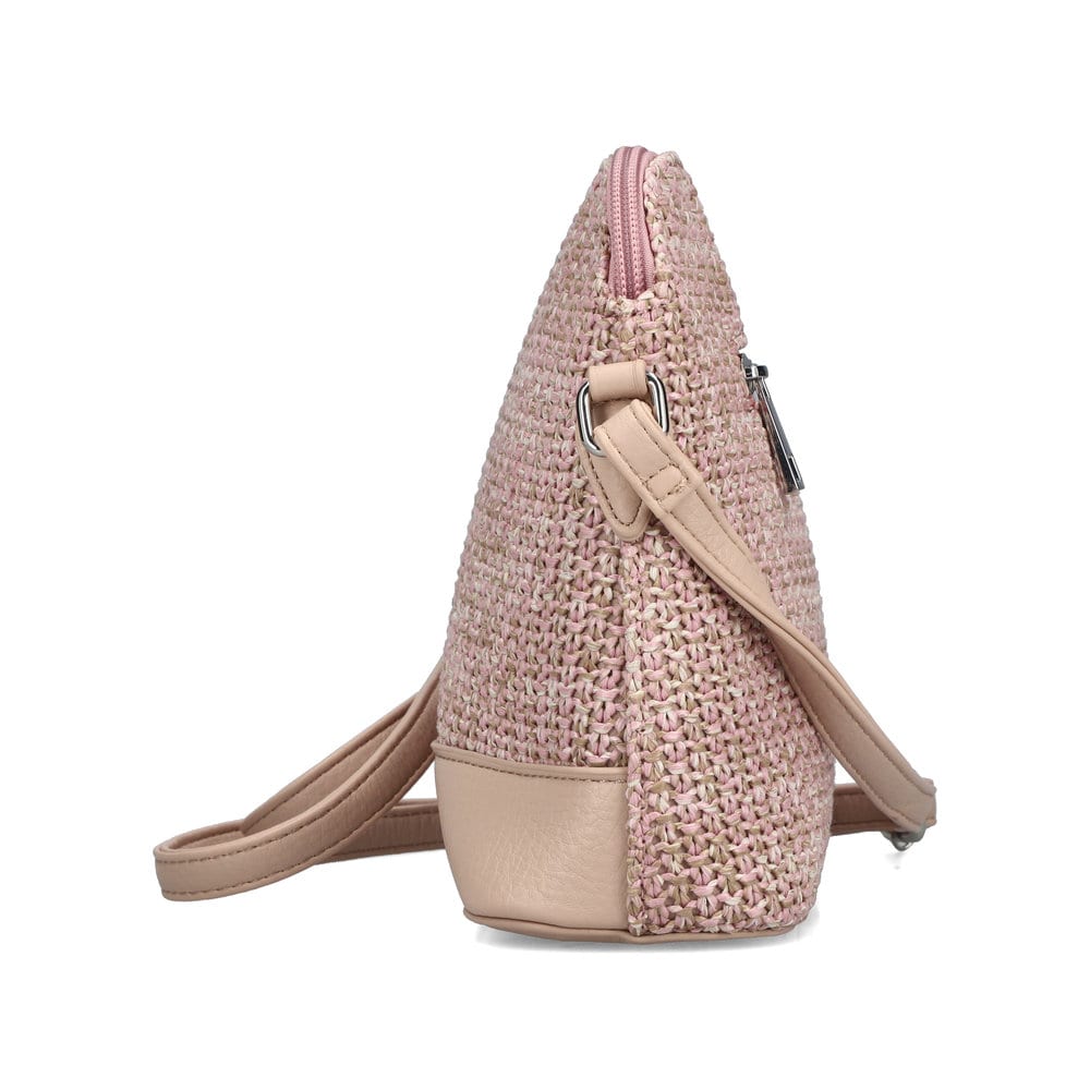 Sac à main Rieker H1510-93 rose avec fermeture éclair et compartiment antivol à l’arrière. Côté gauche.