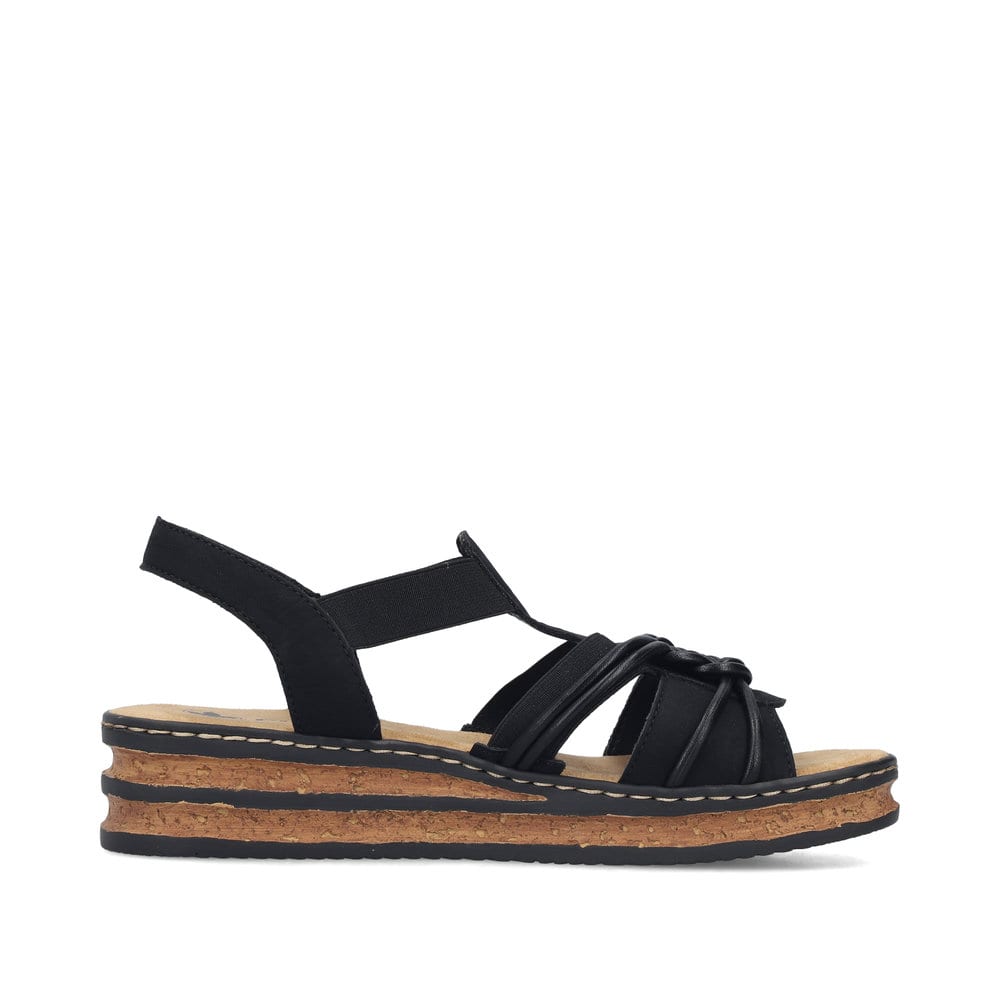 Schwarze Rieker Keilsandaletten 62969-00 mit Gummizug sowie schmaler Passform E. Schuh Innenseite.