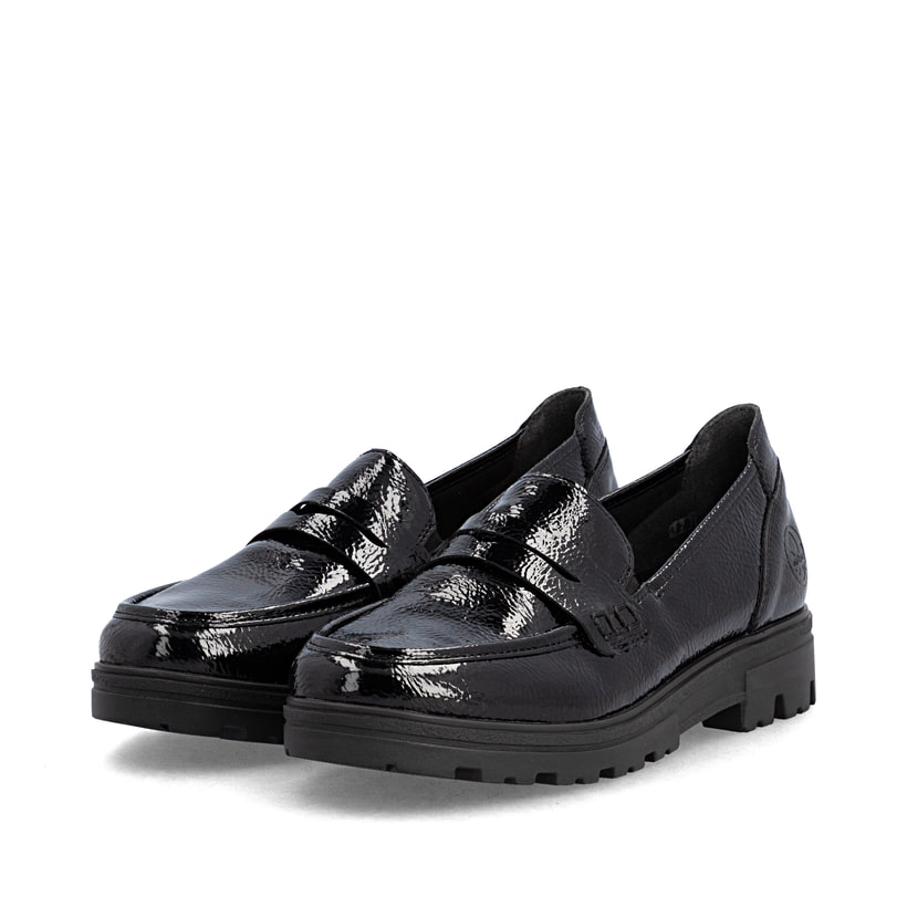 Mocassins Rieker noirs pour femmes 43050-00 avec bande élastique. Chaussures inclinées sur le côté.