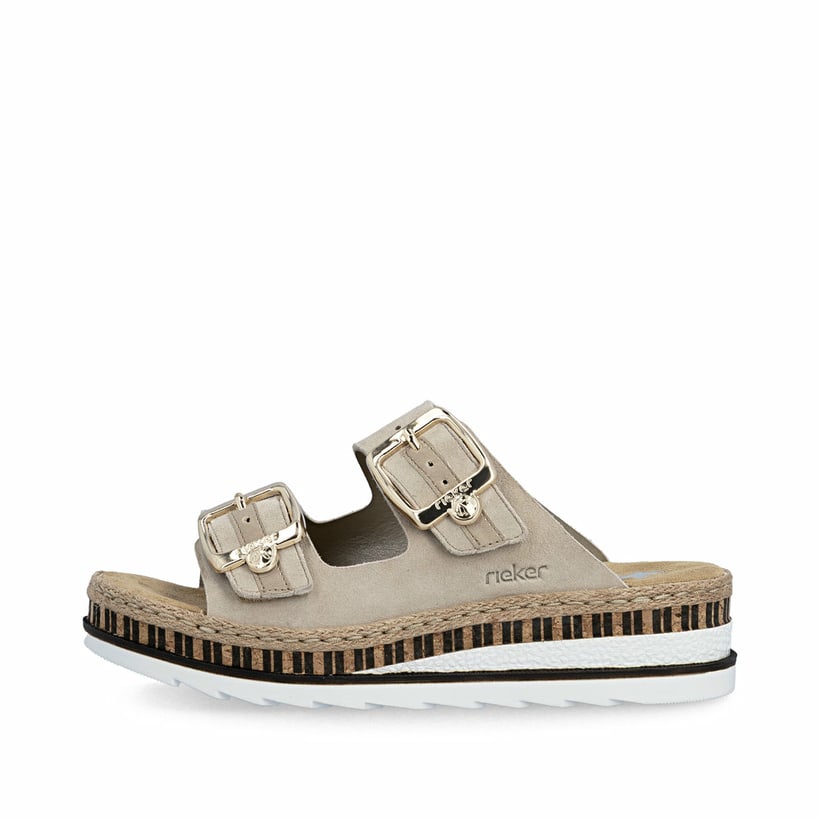 Beige Rieker Damen Pantoletten V7955-60 aus Rauleder mit trendiger Schnalle. Schuh Außenseite.