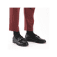 Schwarze Rieker Damen Loafer 46262-01 mit Gummizug sowie extra weicher Decksohle. Schuh am Fuß.
