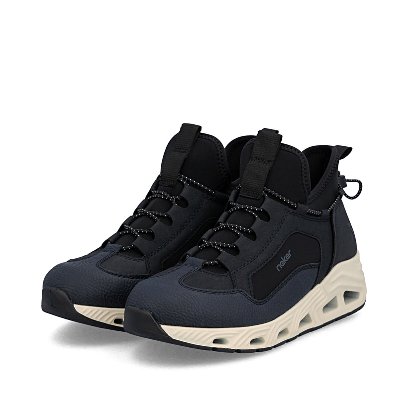 Dunkelblaue Rieker Damen Sneaker Low N5254-14 mit Gummizug sowie Komfortweite G. Schuhpaar seitlich schräg.