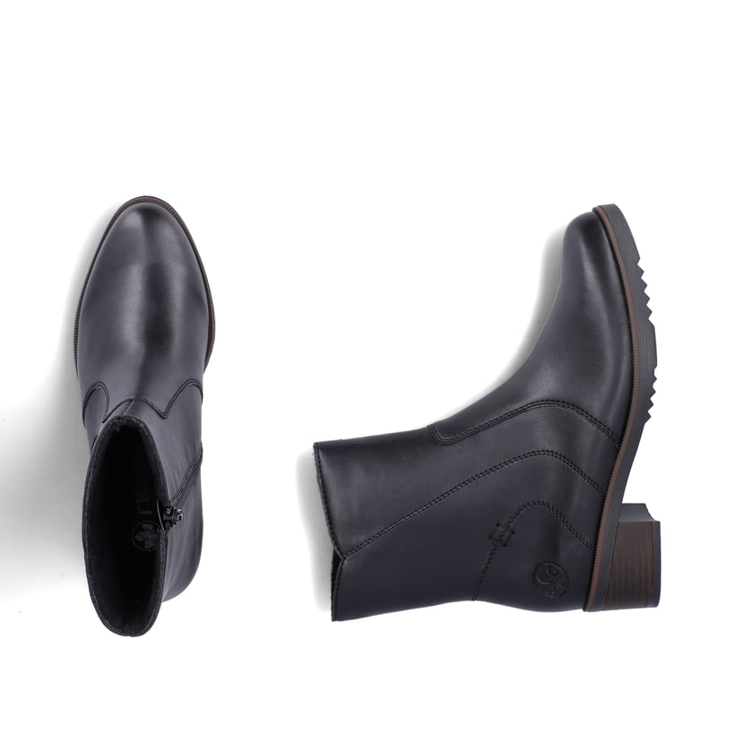 Schwarze Rieker Damen Kurzstiefel Y0581-00 mit modernen Ziernähten. Schuh von oben, liegend.