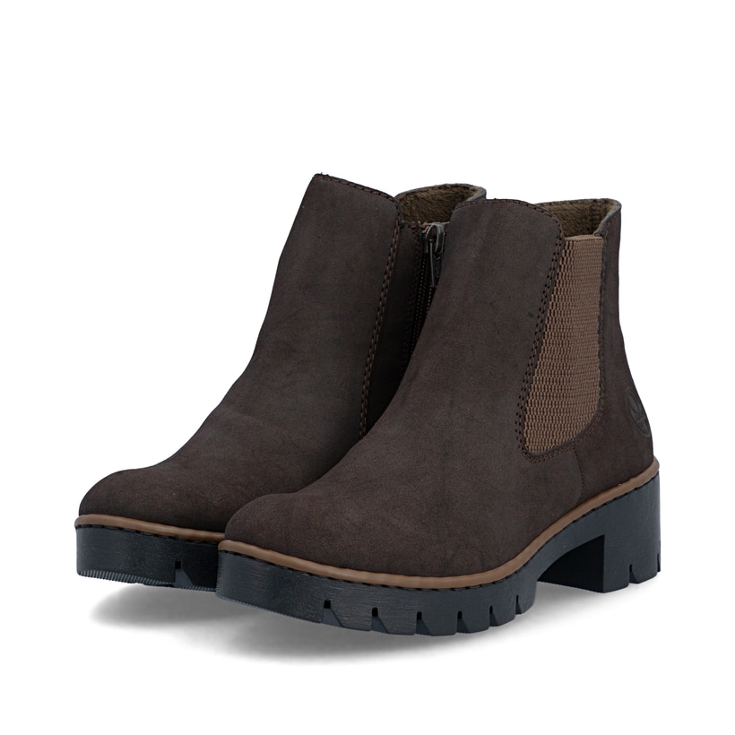 Dunkelbraune Rieker Damen Chelsea Boots X5772-25 mit einem Reißverschluss. Schuhpaar seitlich schräg.