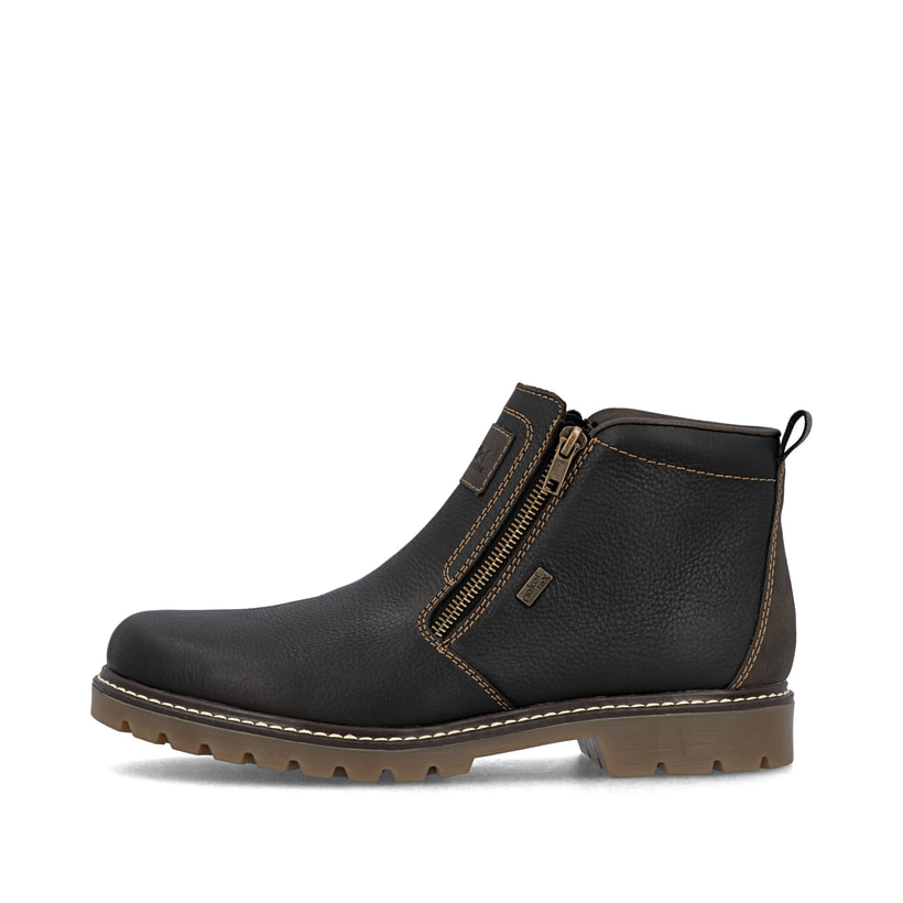 
Schwarzbraune Rieker Herren Kurzstiefel 39871-25 mit Reißverschluss sowie Fiber-Grip. Schuh Außenseite