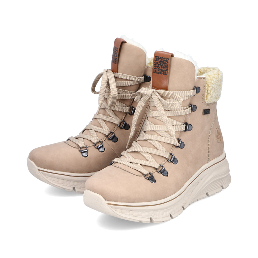 Beige Rieker Damen Schnürstiefel 48034-20 mit einer ultra leichten Plateausohle. Schuhpaar seitlich schräg.
