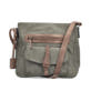 Sac à main Rieker H1340-54 en vert avec sangle décorative tressée, fermeture éclair et poche pour téléphone portable. Face avant.