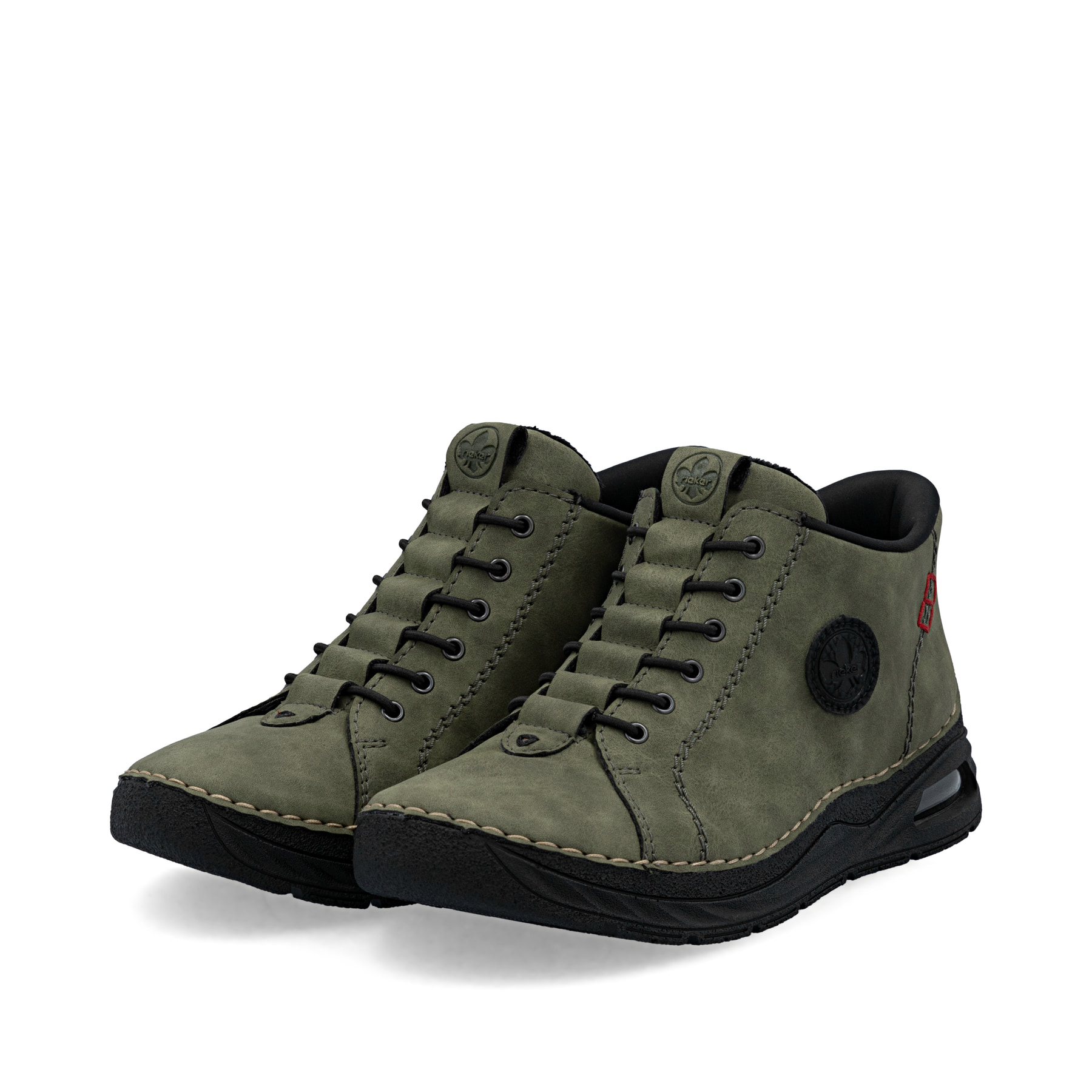 Grünschwarze Rieker Damen Kurzstiefel 44550-54 mit Rieker Air Sohlenfenster. Schuhpaar seitlich schräg.