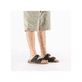 Schwarze Rieker Herren Pantoletten 27090-00 aus Rauleder mit Schnallen. Schuh am Fuß.