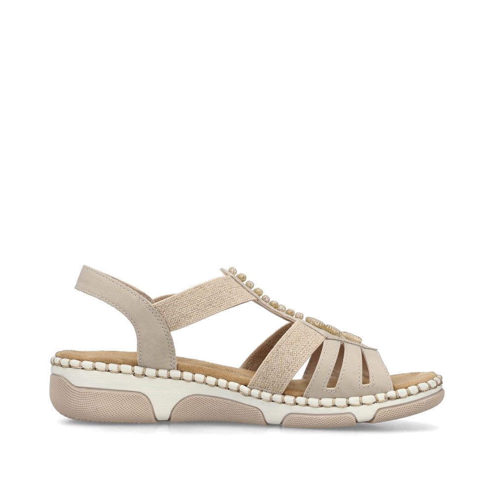 Beige Rieker Damen Riemchensandalen 66201-62 mit Schmuckelementen sowie Gummizug. Schuh Innenseite.