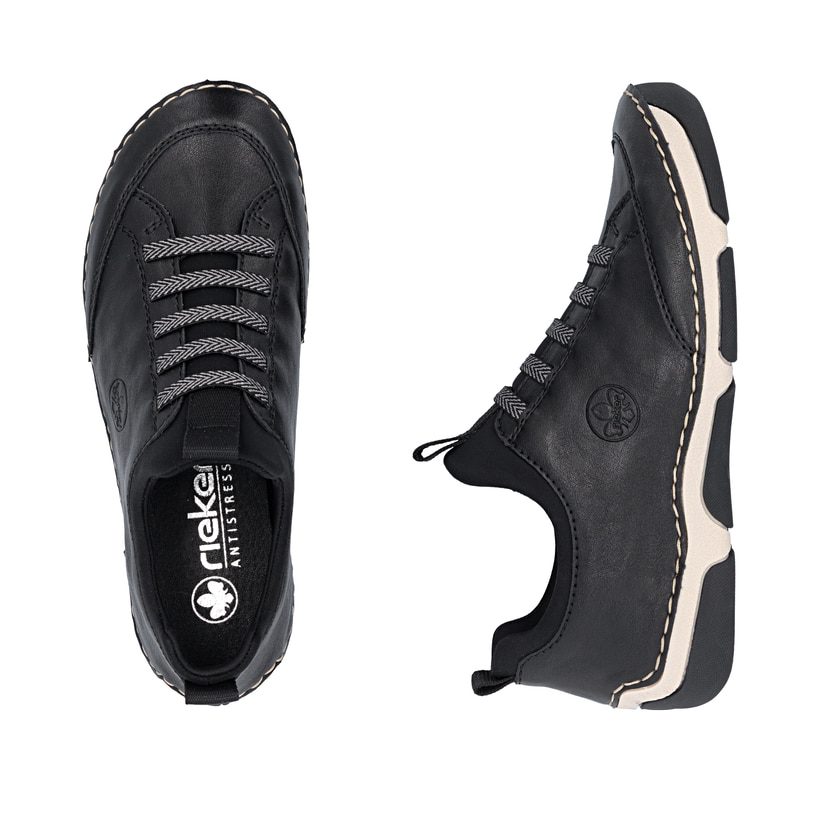 Schwarze Rieker Damen Slipper 55952-00 mit einem Gummizug. Schuh von oben, liegend.