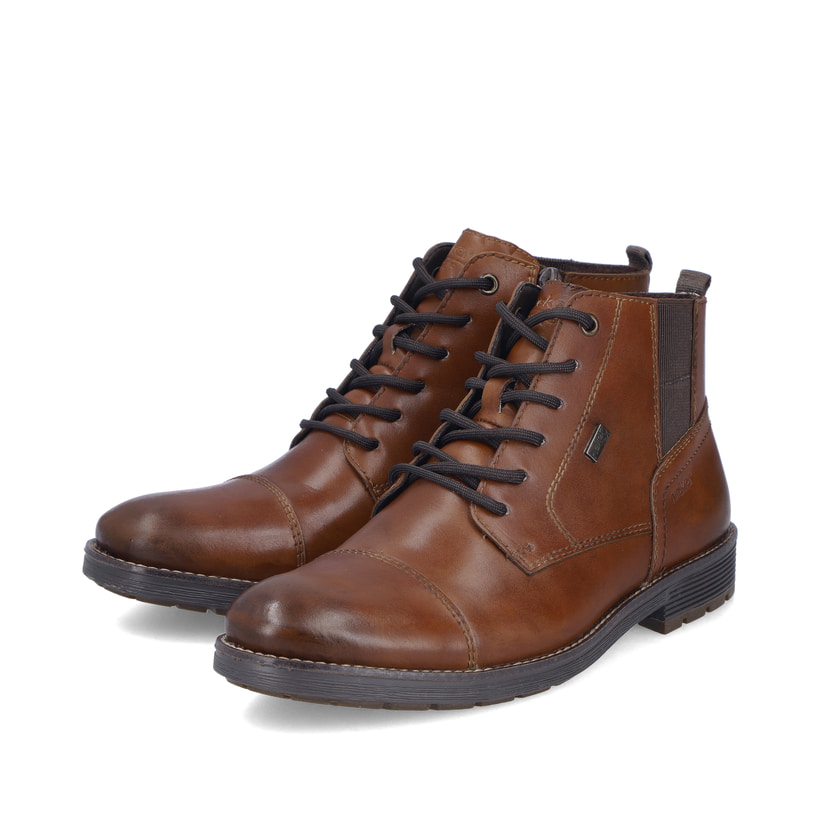 Braune Rieker Herren Schnürstiefel F4512-24 aus Glattleder. Schuhpaar seitlich schräg.