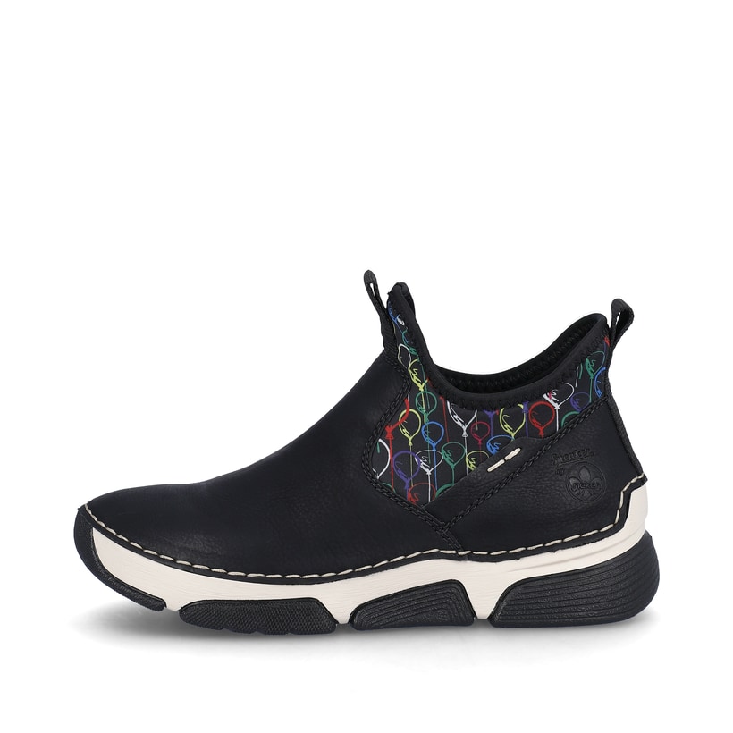
Urbanschwarze Rieker Damen Slipper 45957-00 mit einer schockabsorbierenden Sohle. Schuh Außenseite