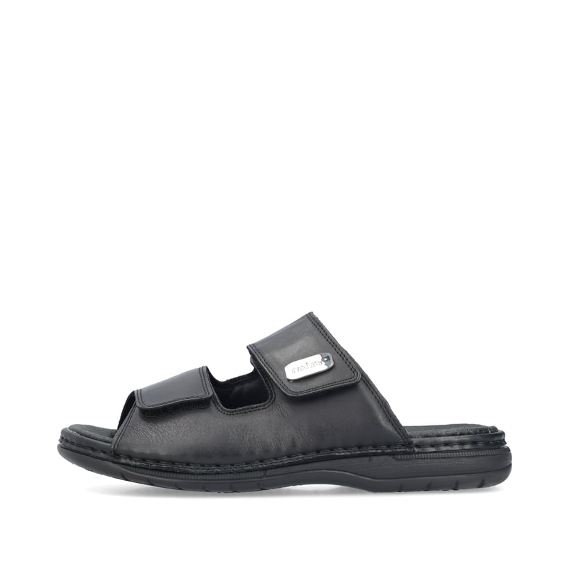 Schwarze Rieker Herren Pantoletten 25590-00 mit einem Klettverschluss. Schuh Außenseite.