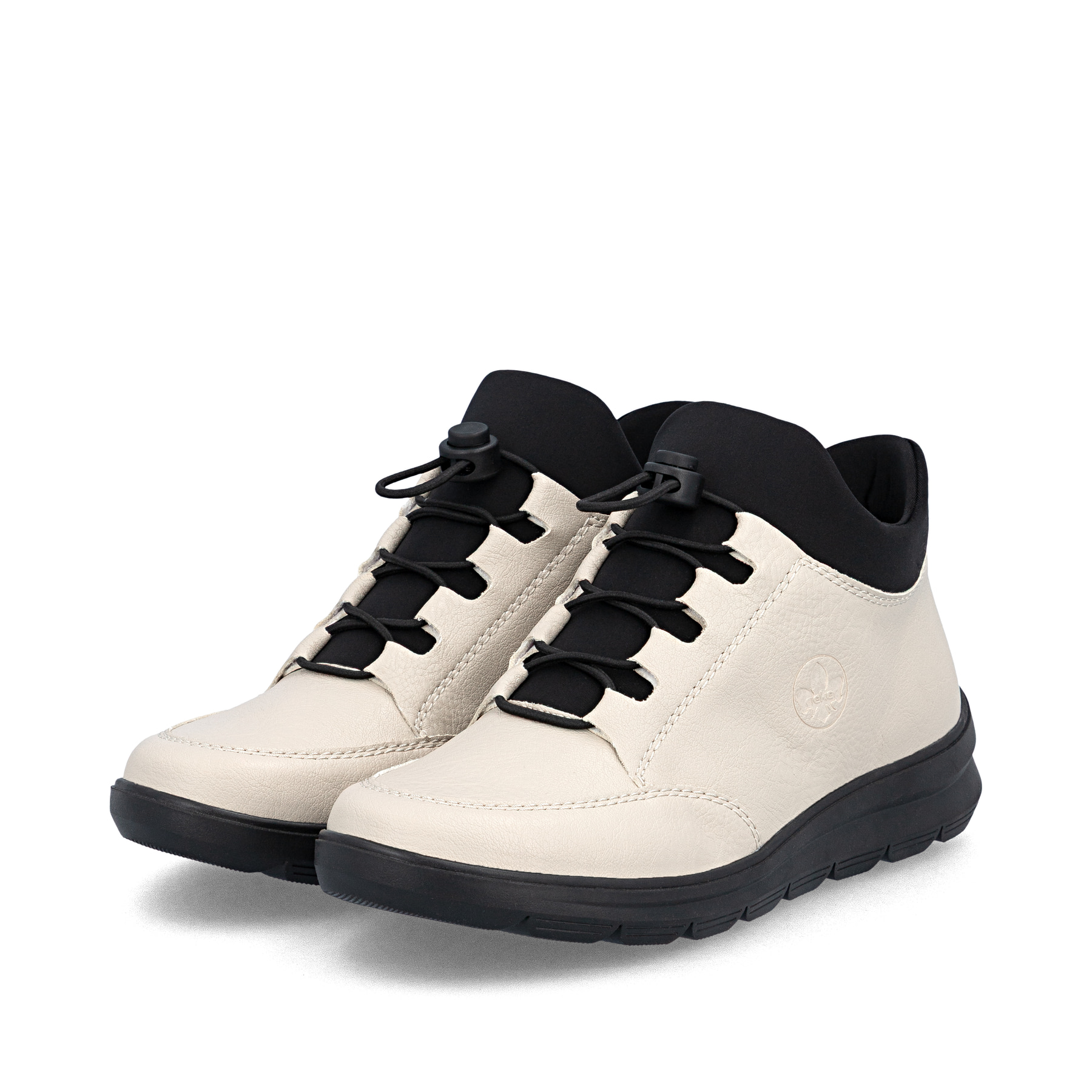 Bottines Rieker beiges pour femmes Z0065-60 avec fermeture éclair. Chaussures inclinées sur le côté.