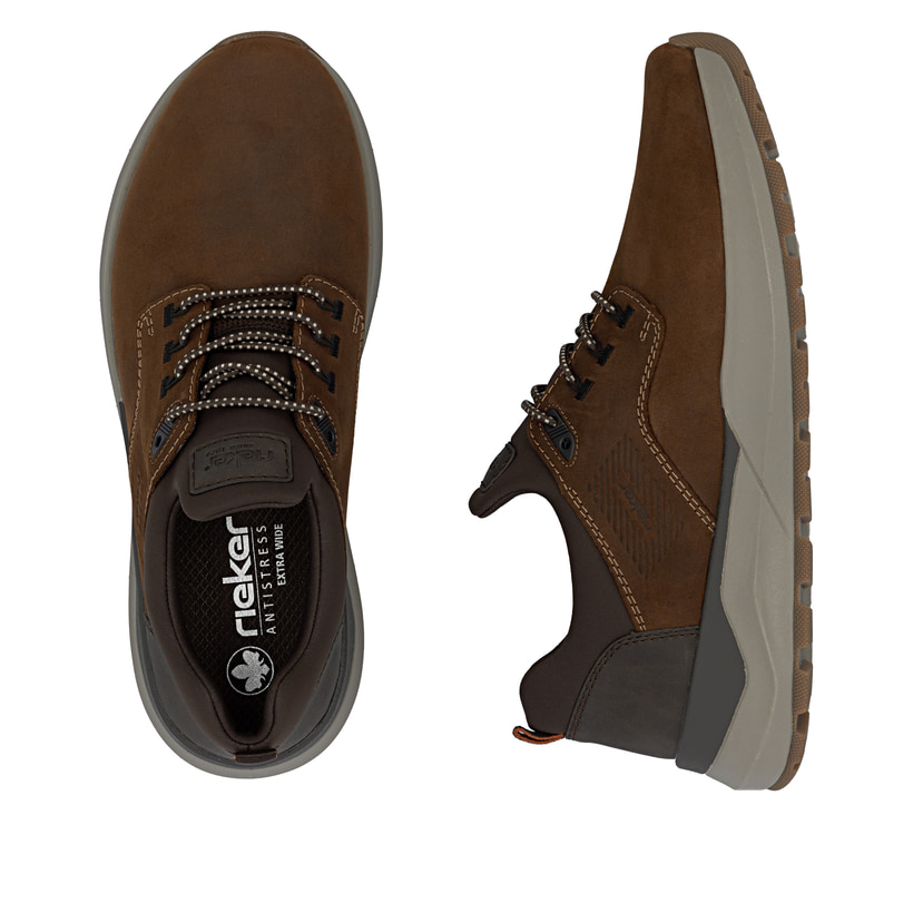 Mocassins Rieker marron homme 06050-22 en cuir suédé avec bande élastique. Chaussure vue de dessus, couchée.