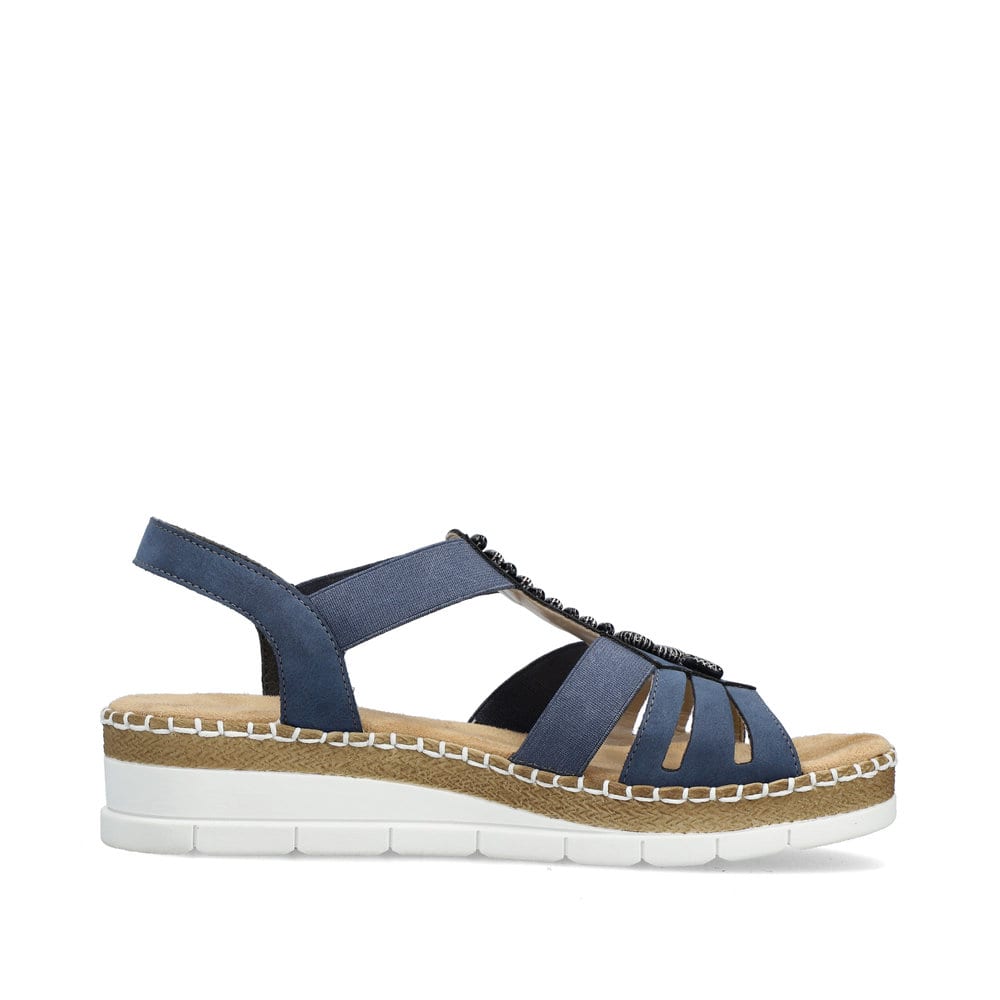 Blaue Rieker Keilsandaletten V1206-14 mit Schmuckelementen sowie einem Gummizug. Schuh Innenseite.
