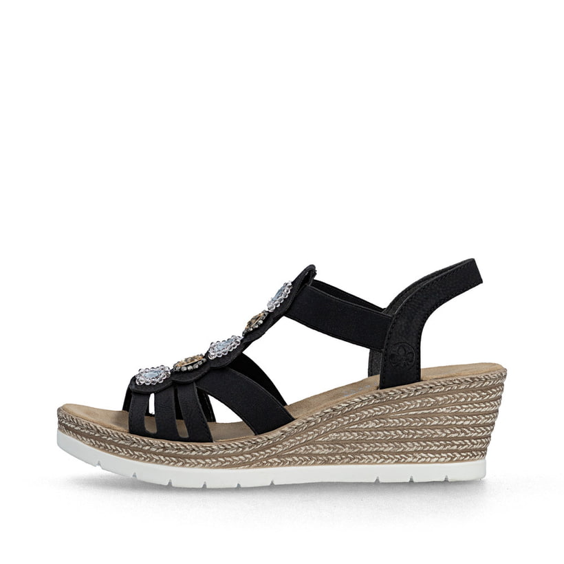 Schwarze Rieker Keilsandaletten 619B2-00 mit Schmuckelementen sowie Gummizug. Schuh Außenseite.