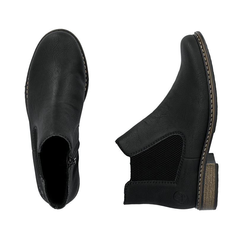 Schwarze Rieker Damen Chelsea Boots Z4994-00 mit einem Reißverschluss. Schuh von oben, liegend.