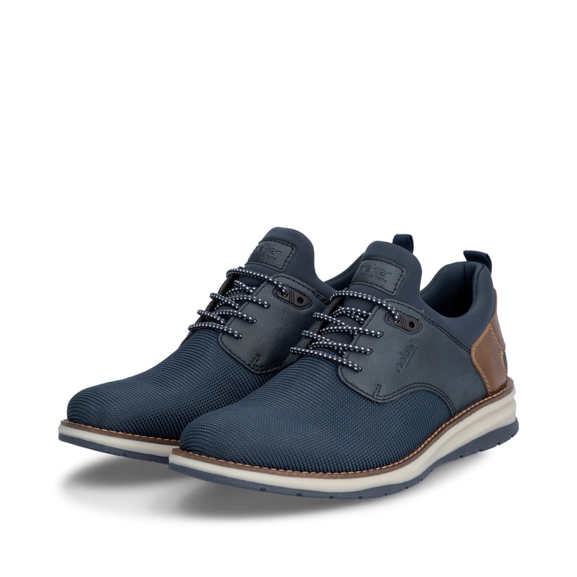 Mocassins Rieker bleus pour homme 14750-14 avec bande élastique. Chaussures inclinées sur le côté.