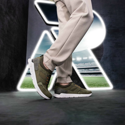 Grüne Rieker Herren Sneaker Low 09102-54 mit Gummizug sowie super leichter Sohle. Schuh Außenseite.