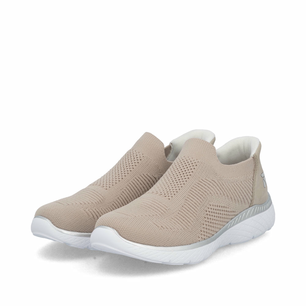 Baskets basses Rieker beiges femme M5072-62 avec option easy in facile. Chaussures inclinées sur le côté.