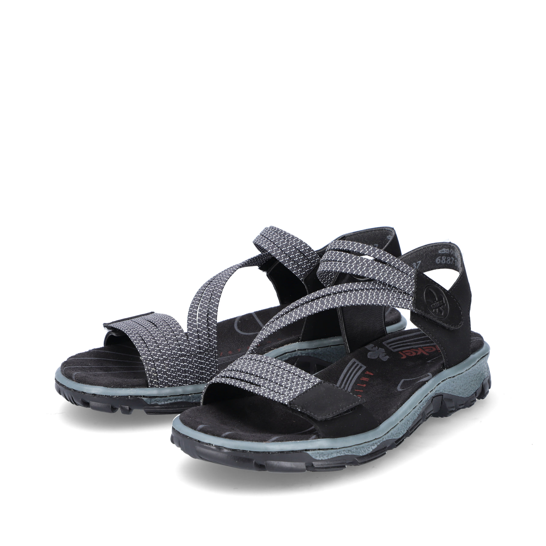 Schwarze Rieker Damen Trekkingsandalen 68871-00 mit einem Klettverschluss. Schuhpaar seitlich schräg.