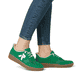 Weiße Rieker Damen Sneaker Low M5520-91 mit einer strapazierfähigen Sohle. Schuh Außenseite gespiegelt.