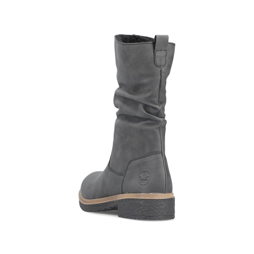 
Sandbeige Rieker Damen Chelsea Boots Z4994-60 mit einer schockabsorbierenden Sohle. Schuh seitlich schräg