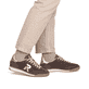 Baskets basses marron Rieker Sport pour femmes W4000-25. Chaussure au pied.