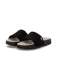 Mules Rieker noires femme W3250-00 avec semelle ultra légère et flexible. Chaussures inclinées sur le côté.