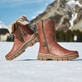 
Braune Rieker Damen Kurzstiefel Z1082-25 mit Reißverschluss sowie Fiber-Grip Sohle. Schuh von vorne.