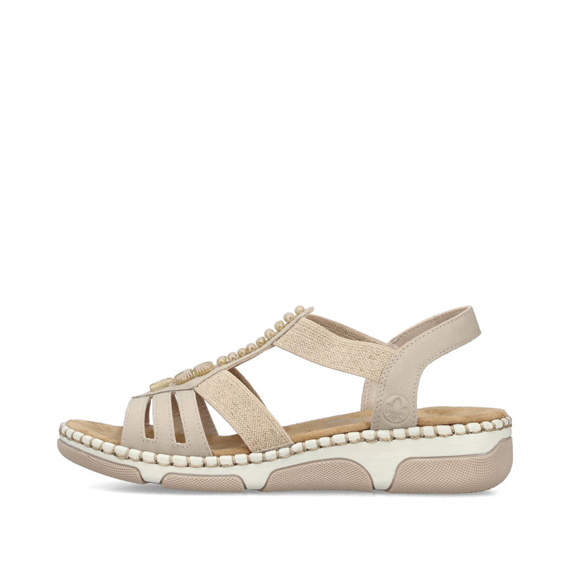 Beige Rieker Damen Riemchensandalen 66201-62 mit Schmuckelementen sowie Gummizug. Schuh Außenseite.