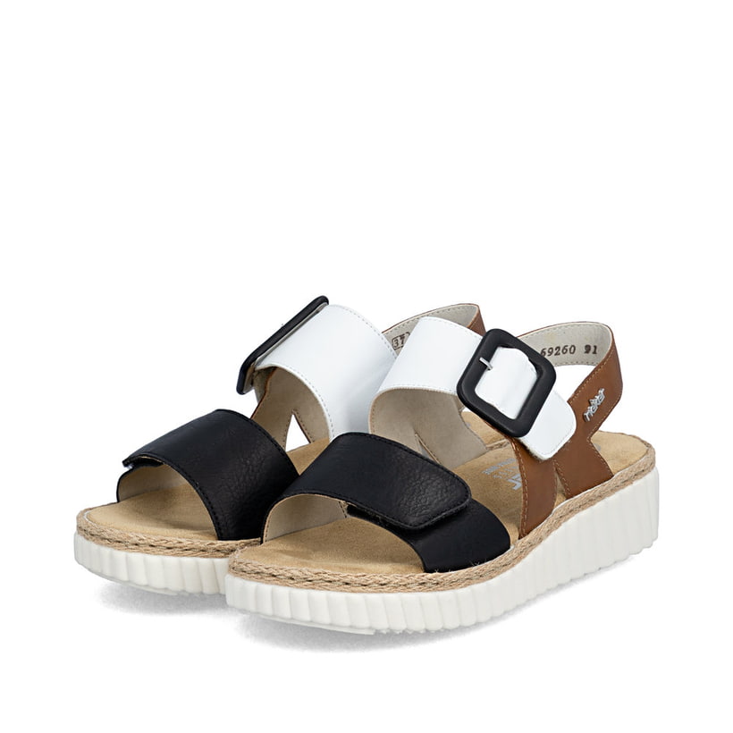 Sandales compensées Rieker multicolores pour femme 69260-91. Chaussures inclinées sur le côté.
