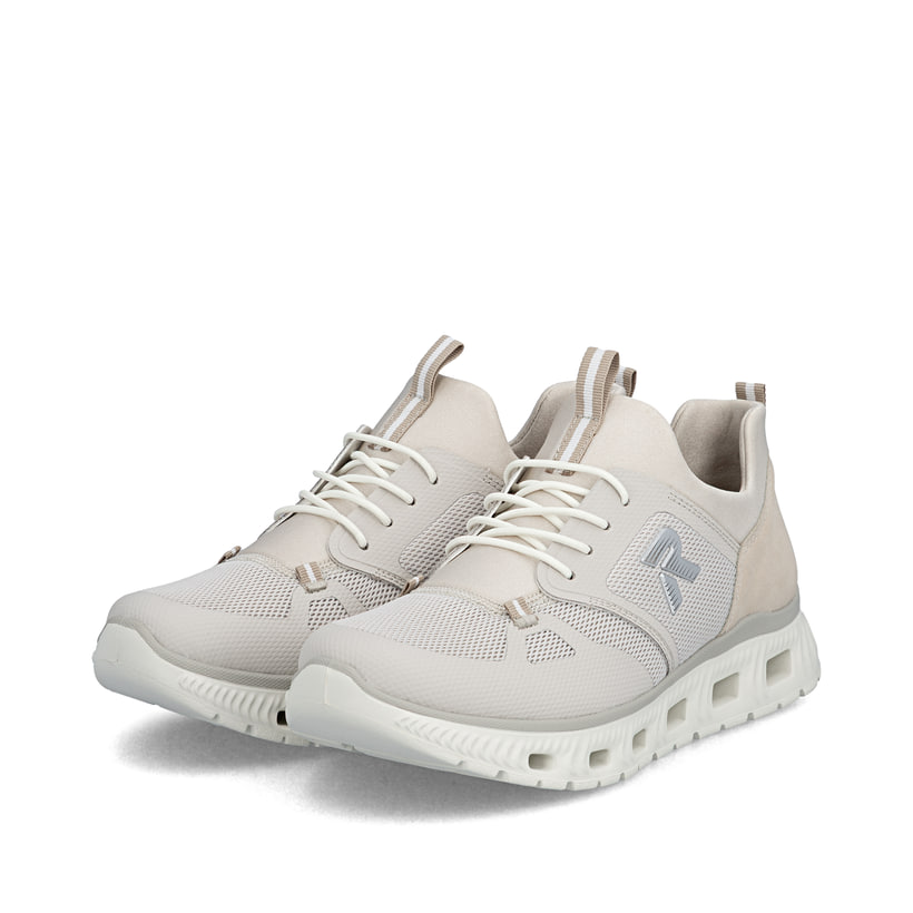 Mocassins Rieker beiges végan pour femmes M6078-60 avec bande élastique. Chaussures inclinées sur le côté.
