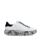Baskets basses Rieker blanches pour femme W1201-83 en cuir lisse. Côté intérieur de la chaussure.